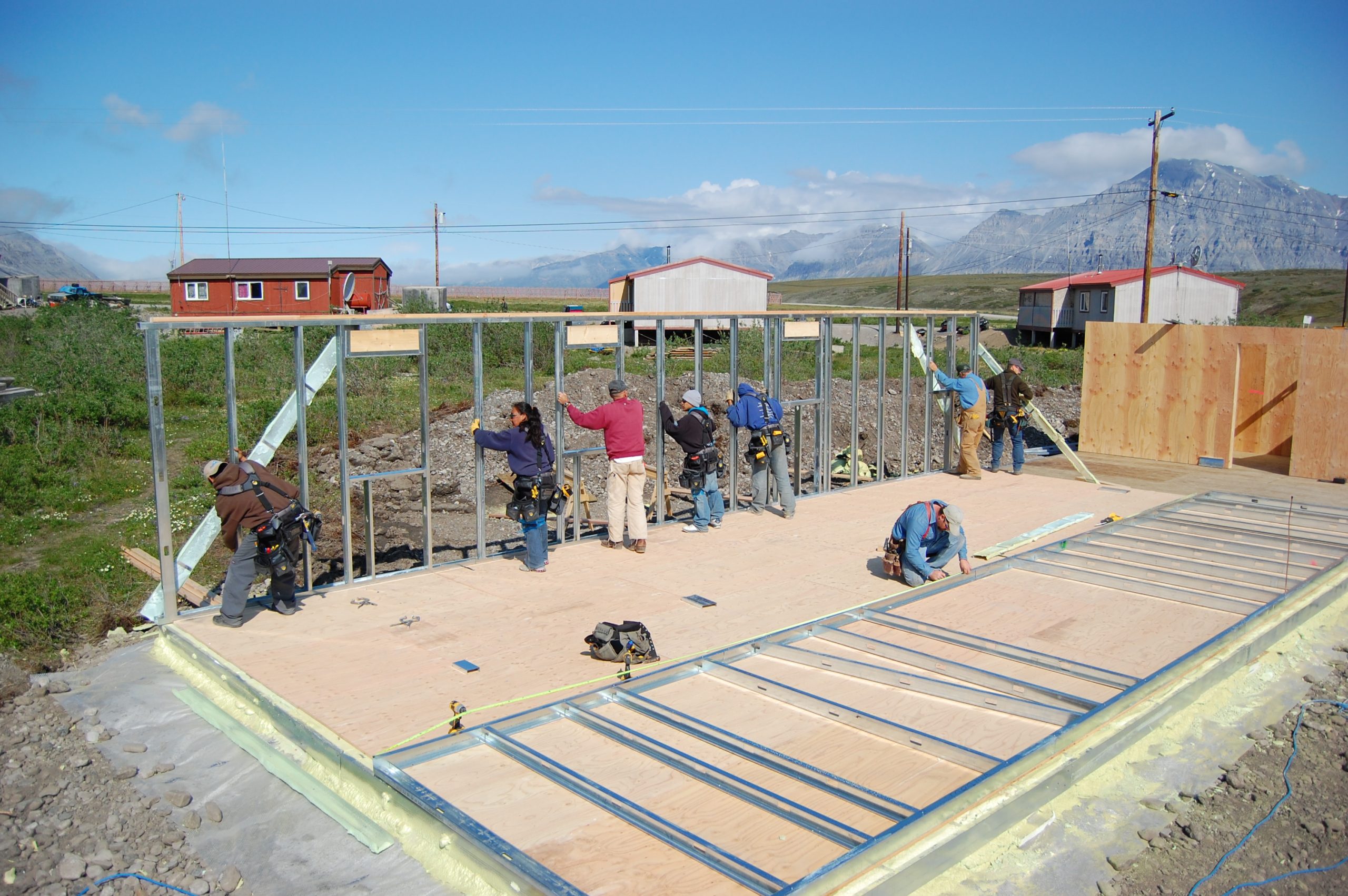 Snow covered cabin in the woods